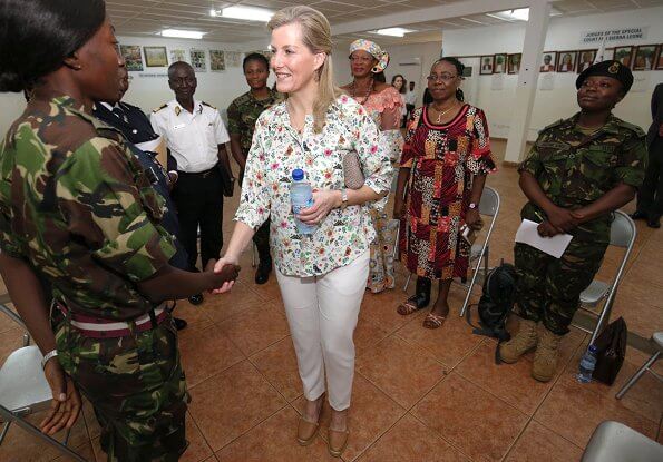 The Countess met with the mayor of Freetown Yvonne Aki-Sawyerr and President Dr. Mohamed Juldeh. floral print blouse and green midi dress