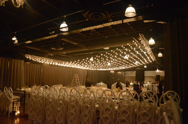 A canopy of lights with round G50 bulbs hanging over the dance floor at The Lighthouse at Chelsea Piers