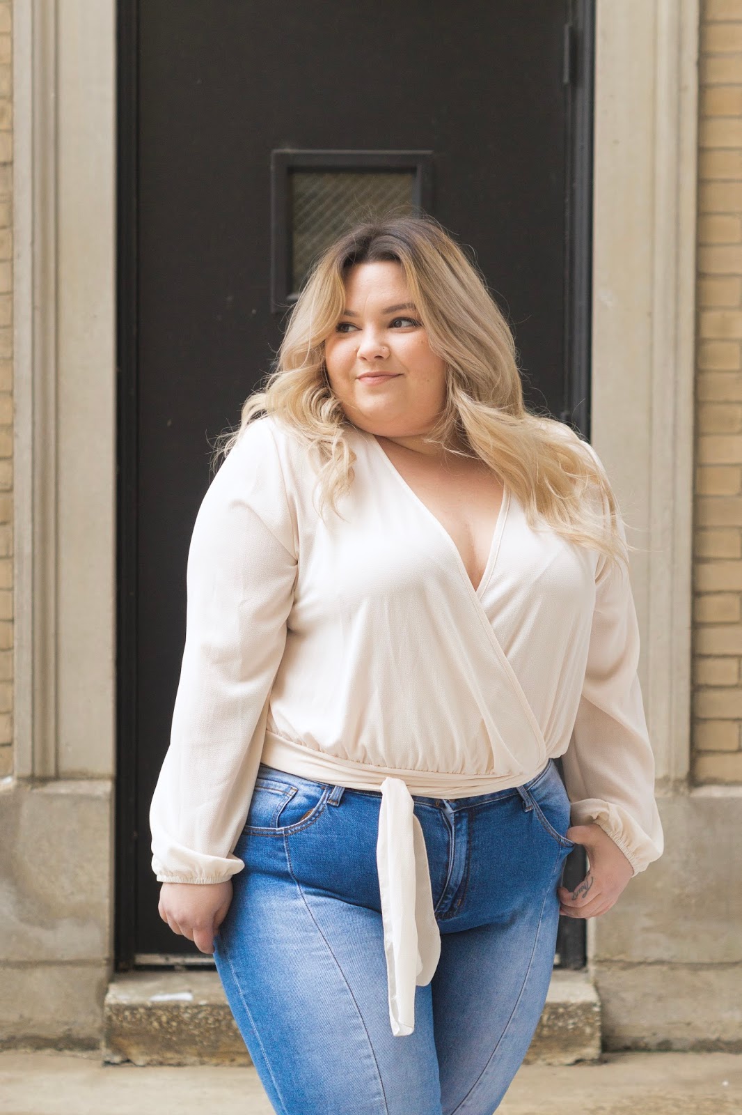 natalie in the city, natalie craig, Chicago fashion blogger, plus size fashion blogger, plus size Chicago model, fashion nova curve, fashion nova, blogger review, plus size pearl denim, affordable plus size clothing, plus size wrap top, trendy plus size clothing, embrace your curves, plus model magazine