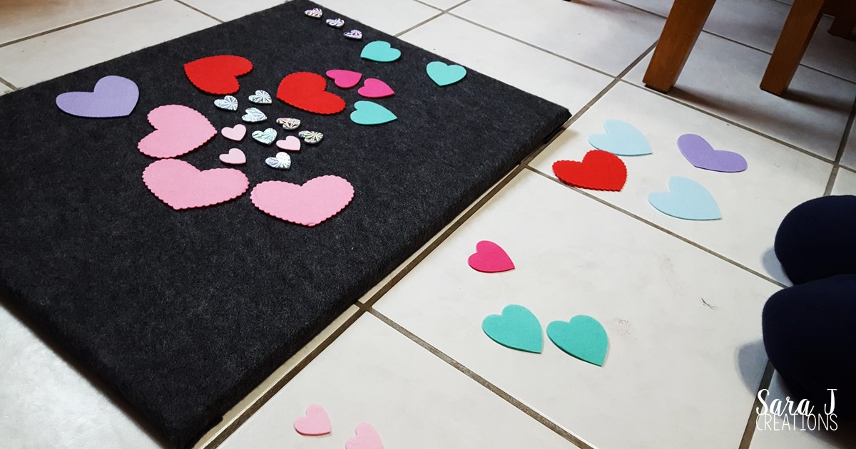 Basic math practice for toddlers and preschoolers using felt hearts to make learning fun and hands on,