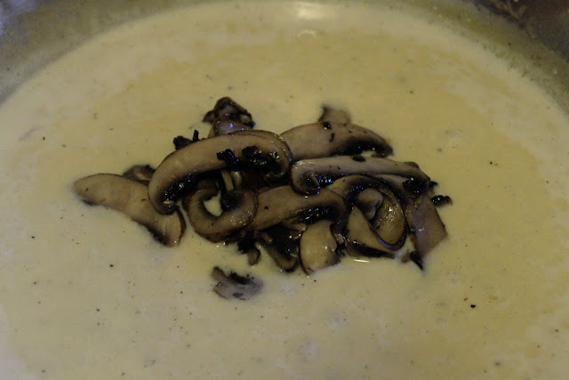 The cooked mushrooms in the Marsala sauce.