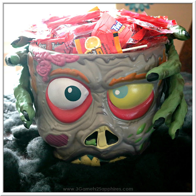 Easy DIY Scary Hands Holding Zombie Head Halloween Centerpiece  |  www.3Garnets2Sapphires.com