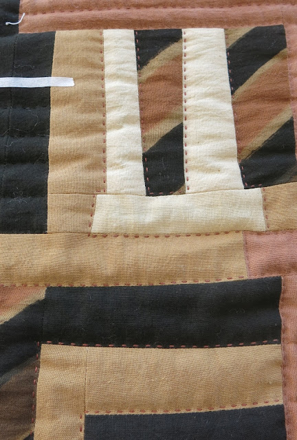 Fabrics from Mali - Hand quilting in progress