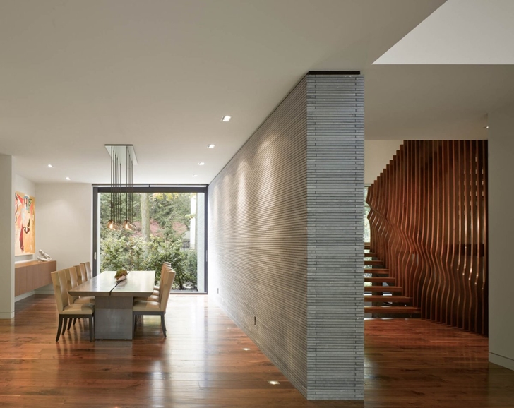 Dining room in Modern mansion by Belzberg Architects Group