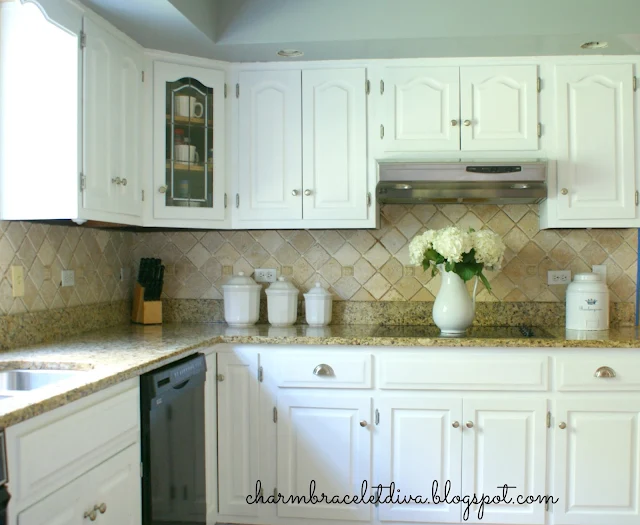 white hydrangeas ironstone pitcher kitchen countertop glass stove top