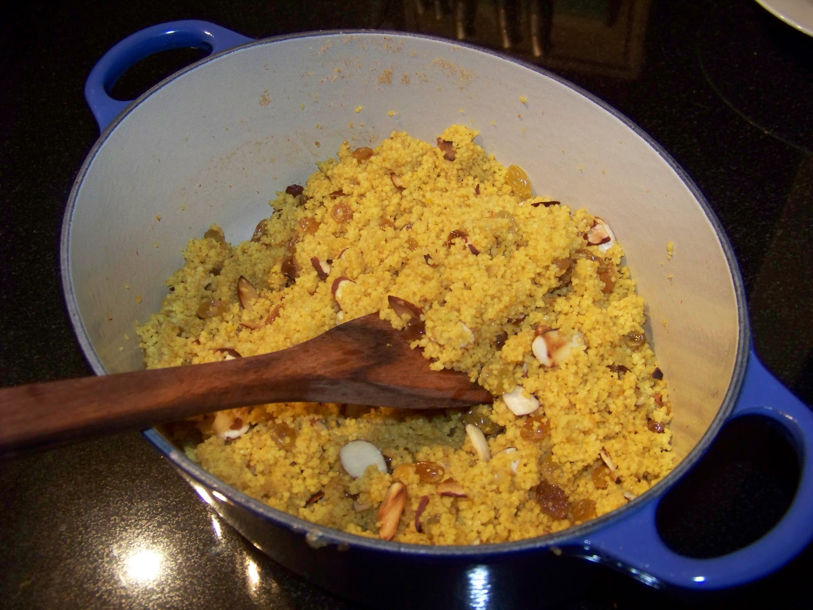 Smiling in the Same Language Couscous with Saffron, Raisins, and Toasted Almonds Recipe