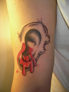 bleeding ear tattoo, bloody ear tattoo bleeding ear tattoo, bloody ear tattoo