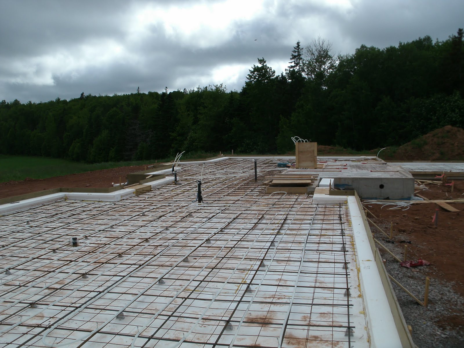 PEI ECO PLUS LIVING PROJECT In floor pipes complete Ready for concrete Water well drilled