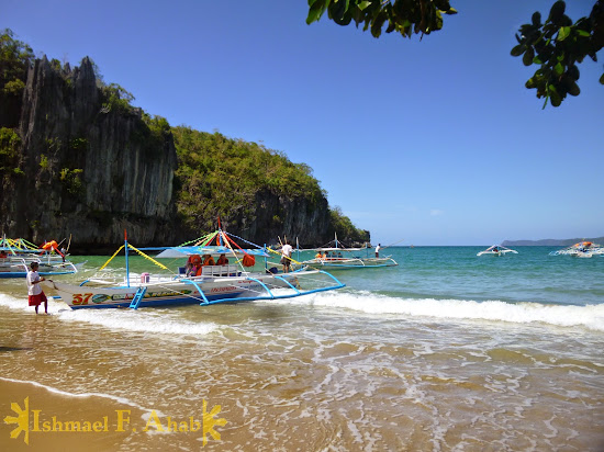 Pulling the boats to the beach of the Puerto Princesa Underground River National Park