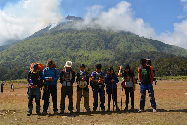 Burning Mt. Apo on the background Burning Mt. Apo on the background