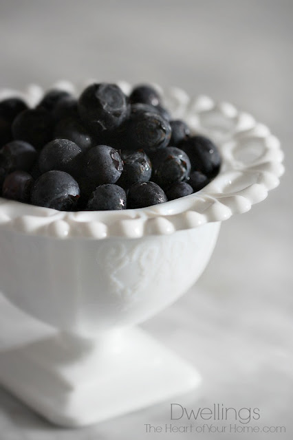 blueberries in milkglass vase