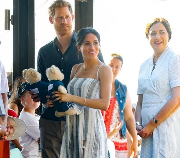 Meghan Markle wore Reformation Pineapple Dress and Sarah Flint Grear Lace Up Sandals. Adina Reyter three diamond amigos curve post earrings