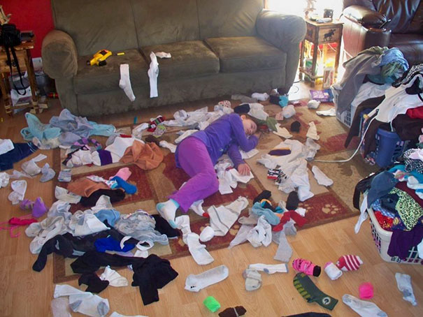 15+ Hilarious Pics That Prove Kids Can Sleep Anywhere - Napping In The Socks Paradise