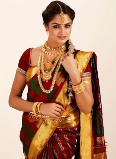 Pattu Sarees with heavy jewelry is definitely worth considering.