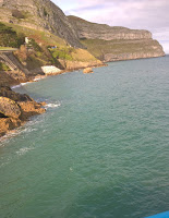 Looking over the pier at Llandudno A photo overlooking taken from the pier in Llandudno.