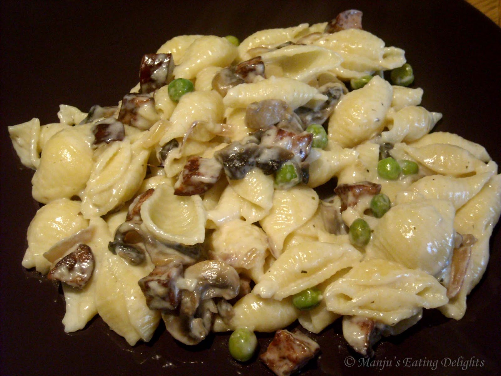 Manju's Eating Delights Pasta Shells in white sauce with Sausage