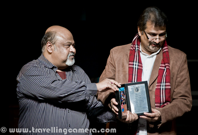 Mr. Parmeet Singh Sethi(Saurabh Shukla) has already dated Shomali Singh(Nigar Khan) and Rinki Chhibbar (Mona Wasu) in RED HOT play during Bharat Rang Mahotsav 2012 and now is the time to continue with last part of the play when Mr. Sethi has invited closest friend of his wife on a date at his Mom's place. Let's check out this Photo Journey with some details about the play and highlights of some special moments...This was the last date of Mr. Sethi during this play and after Savita entered, she kept keeping distance and started talking about right or wrong aspect of their meet outside their houses without telling their life partners. Savita was too tensed as she entered into the houseDuring Red Hot play all three dates were completely different and brilliantly presented with best possible humor in it. The second act was marvelous and Mona Wasu's speaking style was unmatchable. At the same time other actors performed their roles best and Saurabh Shukla was one stage all the time as he was main character of the play. As usual he was brilliant during the play.Continuing the discussion about right and wrong, it reaches to a state when savita talked about the fact that world is full of bad people and Mr Sethi was confronting this fact. Discussion was  really interesting and very humorous :)At times, Mr. Sethi tried to make her comfortable at the house without any guilt, but nothing worked.Slowly the discussion became an argument and now Mr. Sethi was too much irritated of this all. RED HOT play during Bharat Rang Mahotsav was one of the most popular and the play for which tickets were sold within few hrs on Bookmyshow.com. Many folks like me were not able to get the ticket. I again thank to NSD Repertory artists Mr. Sukumar Tudu,who arranged one ticket for meAt times Mr. Sethi was shocked on some of the reasoning by Savita :) .. Above photograph from RED HOT is showing wonderful expressions of Mr. Saurabh Shukla, who has also directed this play apart from his marvelous acting in it.Finally he got frustrated and started talking some facts about his life and how he started thinking about dating other ladies outside home..Full bio of extremely talented Actor and Director, Saurabh Shukla, can be seen at http://www.imdb.com/name/nm0795661/biFinally Mr. Sethi accepted that he can't even think of indulging into an extra marital affair and calls her wife to offer a date on dinner. It's again a wonderful conversation where his wife insist to go to a dhaba in Delhi rather than spending unnecessary money in any other 5 star hotel... Play ends with this telephonic conversation and whole Kamani Auditorium was standing to appreciate the wonderful acting by every actor on the stageHere are three ladies of this play Savita Prasann by Preeti Mamgai, Rinki Chhibbar by Mona Wasu and Shomali Singh by Nigar Khan !!!Saurabh shukla introducing each and every member of the crew with great honor for everyone. Saurabh Shukla presenting flowers to his team after successful completion of RED HOT play at Kamani Auditorium, during Bharat Rang Mahotsav 2012.Mona Wasu, Nigar Khan and Prashant Sehgal on stage of Kamani Auditorium after completion of RED HOT play during Bharat Rang Mahotsav 2012.Red Hot, by Saurabh Shukla , follows the travails of Parminder Singh Sethi (Saurabh Shukla), who`s suffering from a midlife crisis. He owns a restaurant at Khan Market, New Delhi which isn't doing very well. Parminder is bored to death with the mundane routine of his life. He feels as though life has passed him by, and he has nothing left to look forward to. In his state of ennui, And for the first time in his 22-year marriage, he`s seriously considering to indulge, thinking it might bring some excitement back into his life. However, indulging with a woman is much easier said than done. In the processes of making his fantasies a reality, Parminder meets THREE WOMEN.... And the hell breaks loose! This is how it was defined on one of the websites I looked for this play.