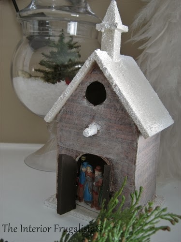 Its beginning to look a lot like Christmas! Wrapping a birdhouse with sheet music and faux snow