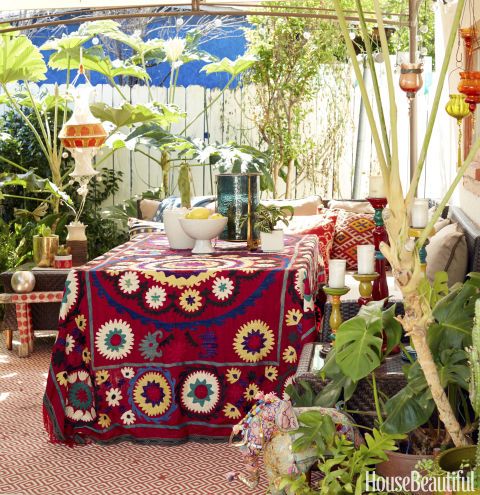 Boho home decor's maximalist maven share renovation - Jungalow patio BoHoHome.com @bohosusan; Justina Blakeney interview in House Beautiful. Photos by David Tsay