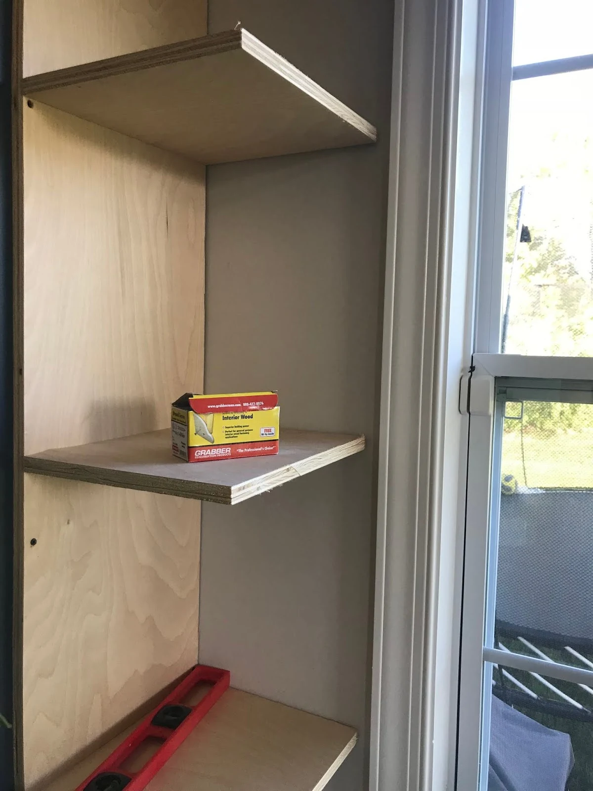 DIY bookcases by windows