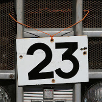 Photograph of a sign showing the number 23