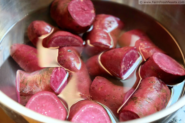 boiling chunks of purple sweet potatoes