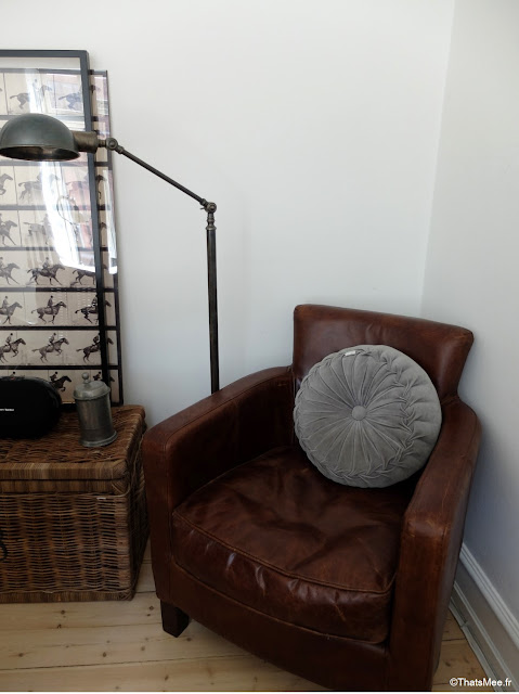 Appartement à Copenhague deco du Salon fauteuil club cuir vintage