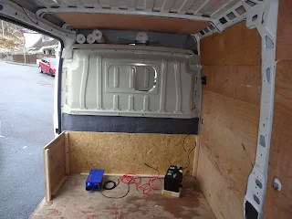 van conversion flooring with battery 