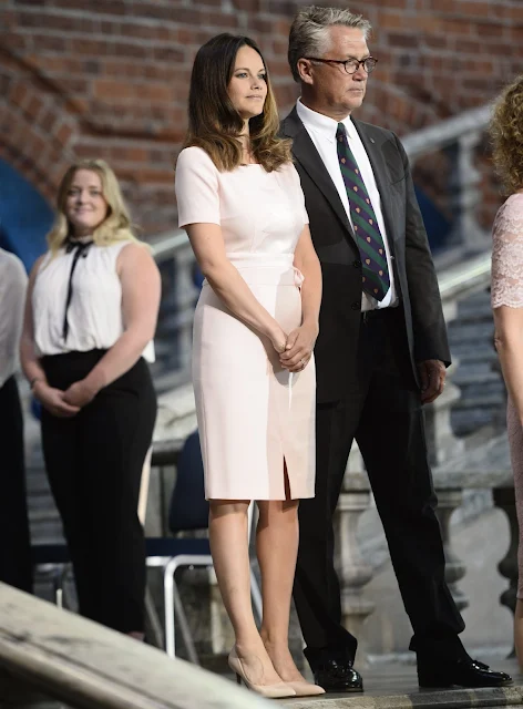 Swedish Princess Sofia attends graduation ceremony for sophia sisters at Stockholm City Hall. Princess Sofia wore dress