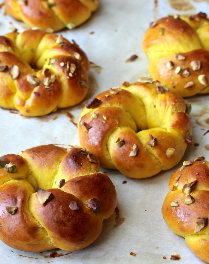 These Sfoofs are lovely yeasted buns colored with turmeric and flavored with anise seeds, mahleb, and orange blossom water, and then studded with pistachios.