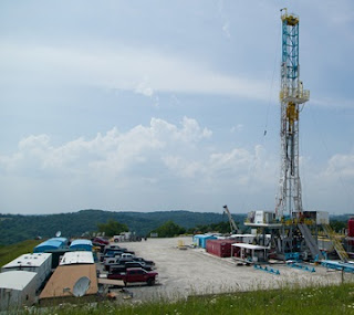 drilling rig, pickup for scale