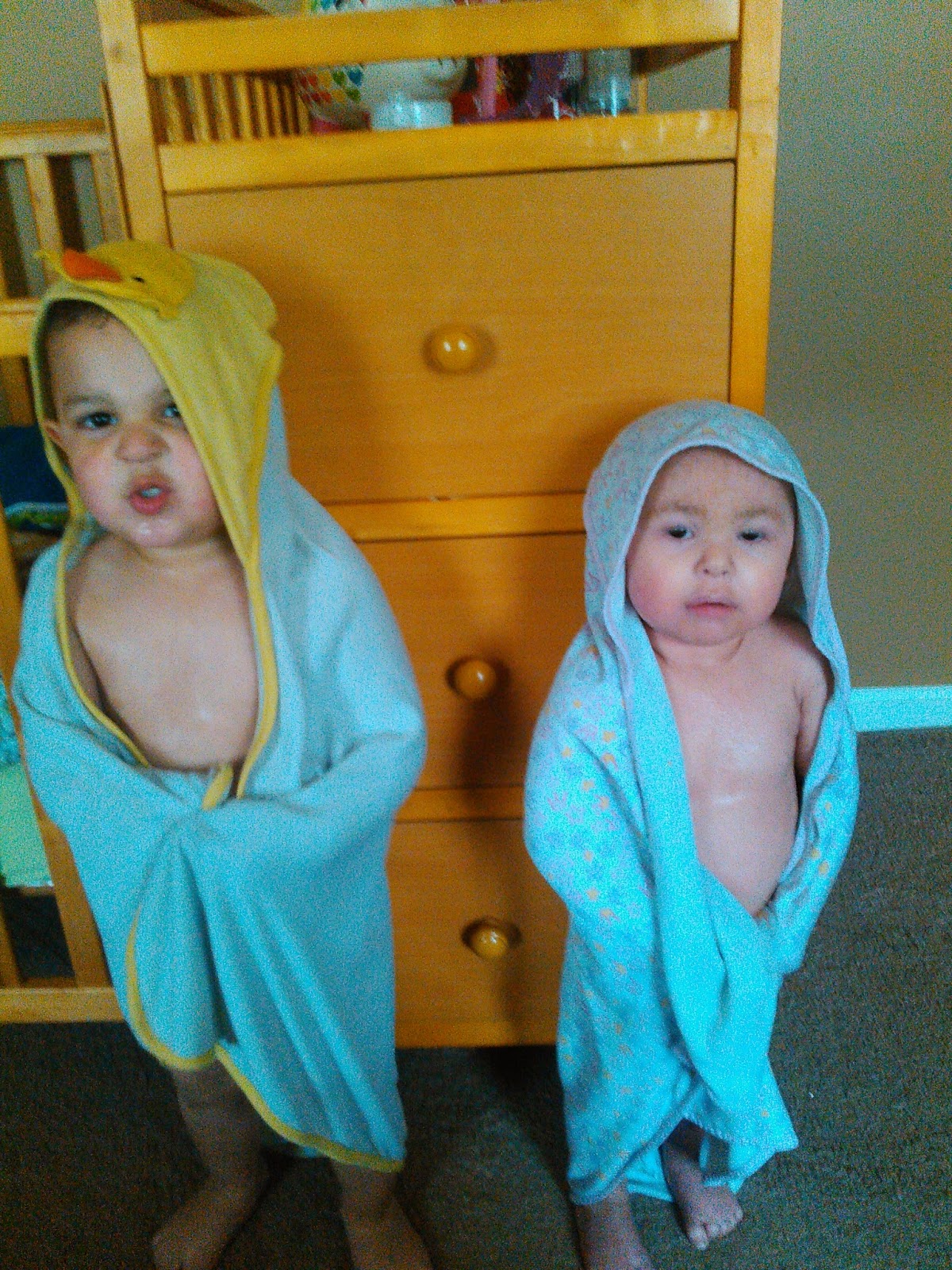 Brooklyn, who has ichthyosis,with her brother after a bath