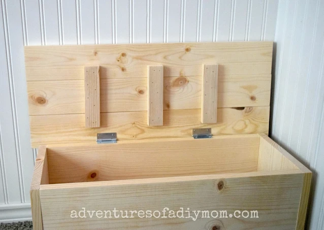 wooden toy box with hinged lid