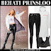 Behati Prinsloo in white raincoat and black vinyl pants in NYC on November 5