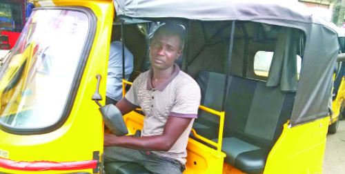 crippled riding tricycle lagos