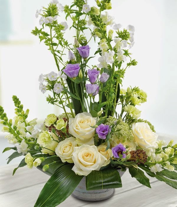 Zinc Urn Arrangement - Cream Roses, Blue and White Flowers.
