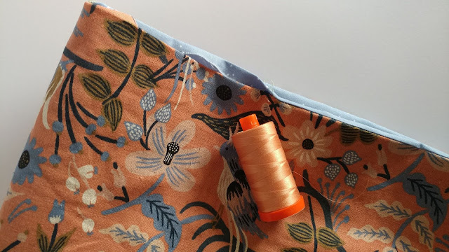 Aurifil thread, leather handles, rivets, and a canvas Les Fleurs fabric by Rifle Paper Co. and Cotton + Steel make this a great tote bag for summer!
