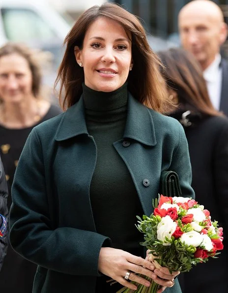 Princess Marie wore Hugo Boss Relaxed-fit coat, and Jimmy Choo grainy calf leather knee high boots, she carries YSL Saint Laurent clutch