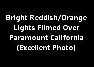 Bright Reddish/Orange Lights Filmed Over Paramount California (Excellent Photo)