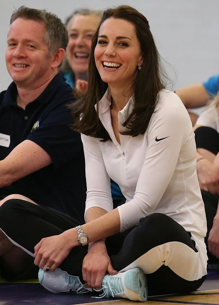 Catherine, Duchess of Cambridge takes part in a tennis workshop with Andy Murray's mother Judy at Craigmount High School in Edinburgh 