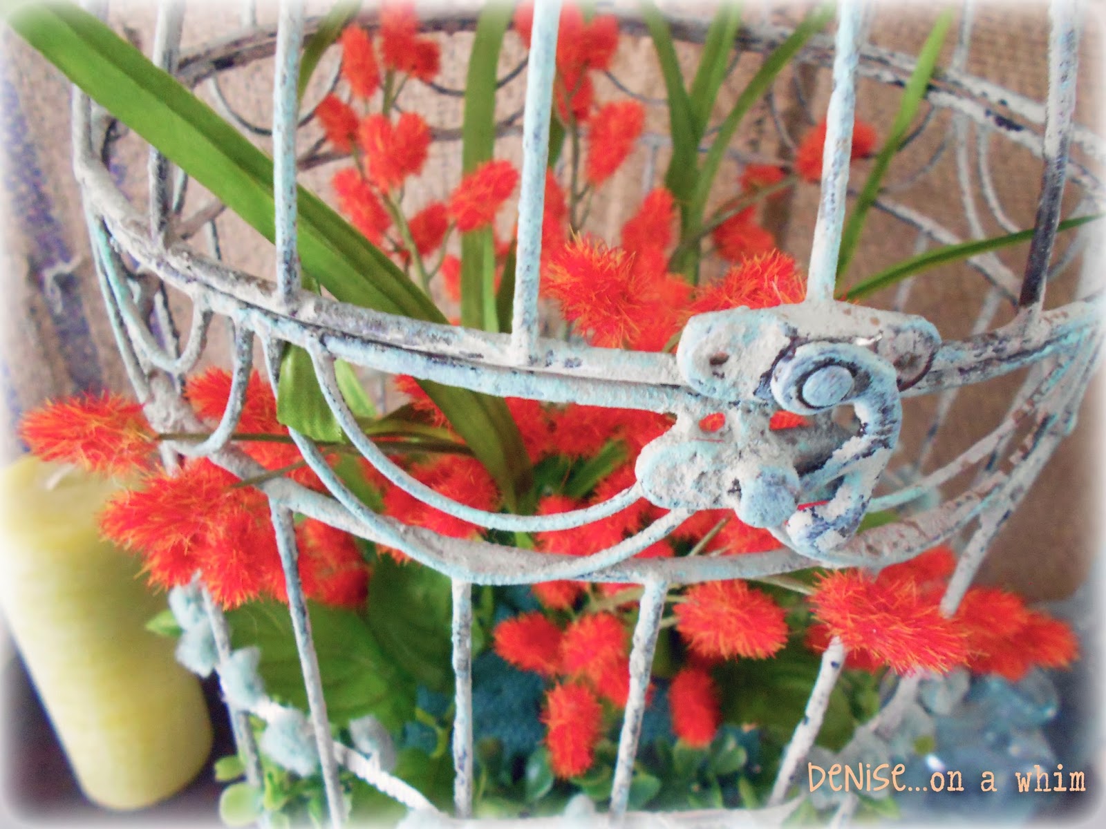 Orange Stems and Faux Boxwood in a Shabby Birdcage via http://deniseonawhim.blogspot.com