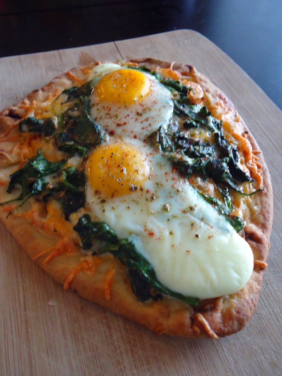 Foodie & Fabulous Breakfast Flatbread with Fried Eggs and Greens