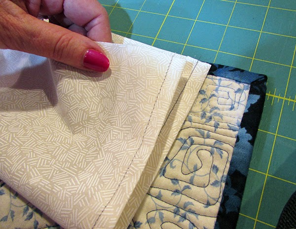 adding a quilt sleeve
