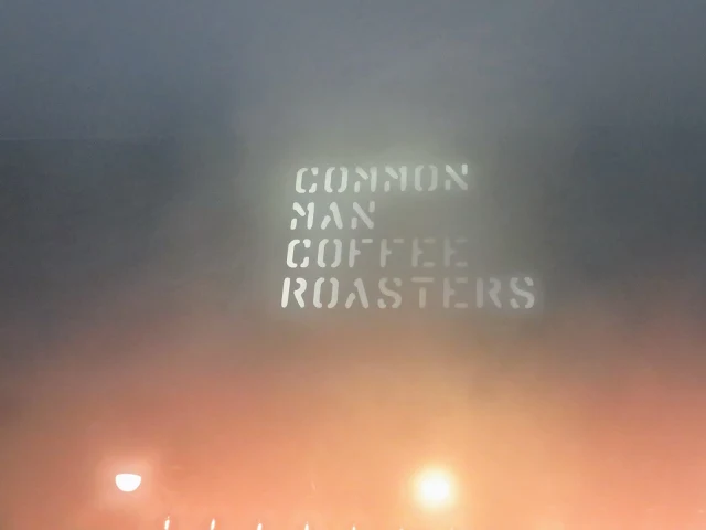 Common Man Coffee Roasters Sign Fogged Over by Humidity in Singapore