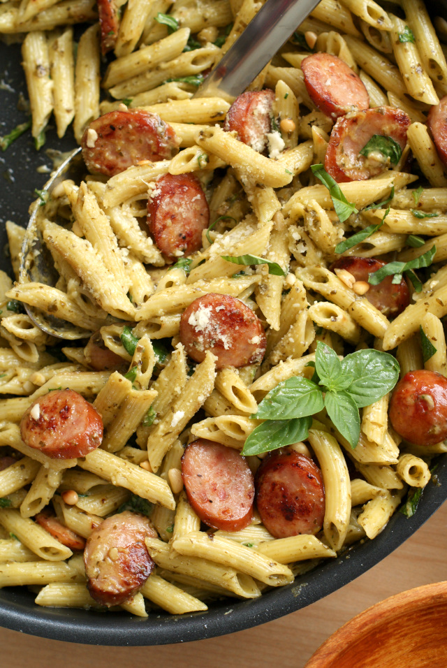 One Pan Sausage and Creamy Pesto Pasta from The Two Bite Club is a cheesy, hearty, family-friendly dinner that is on the table in just 20 minutes and cooks in just one pan! #OnePanPronto @walmart #ad