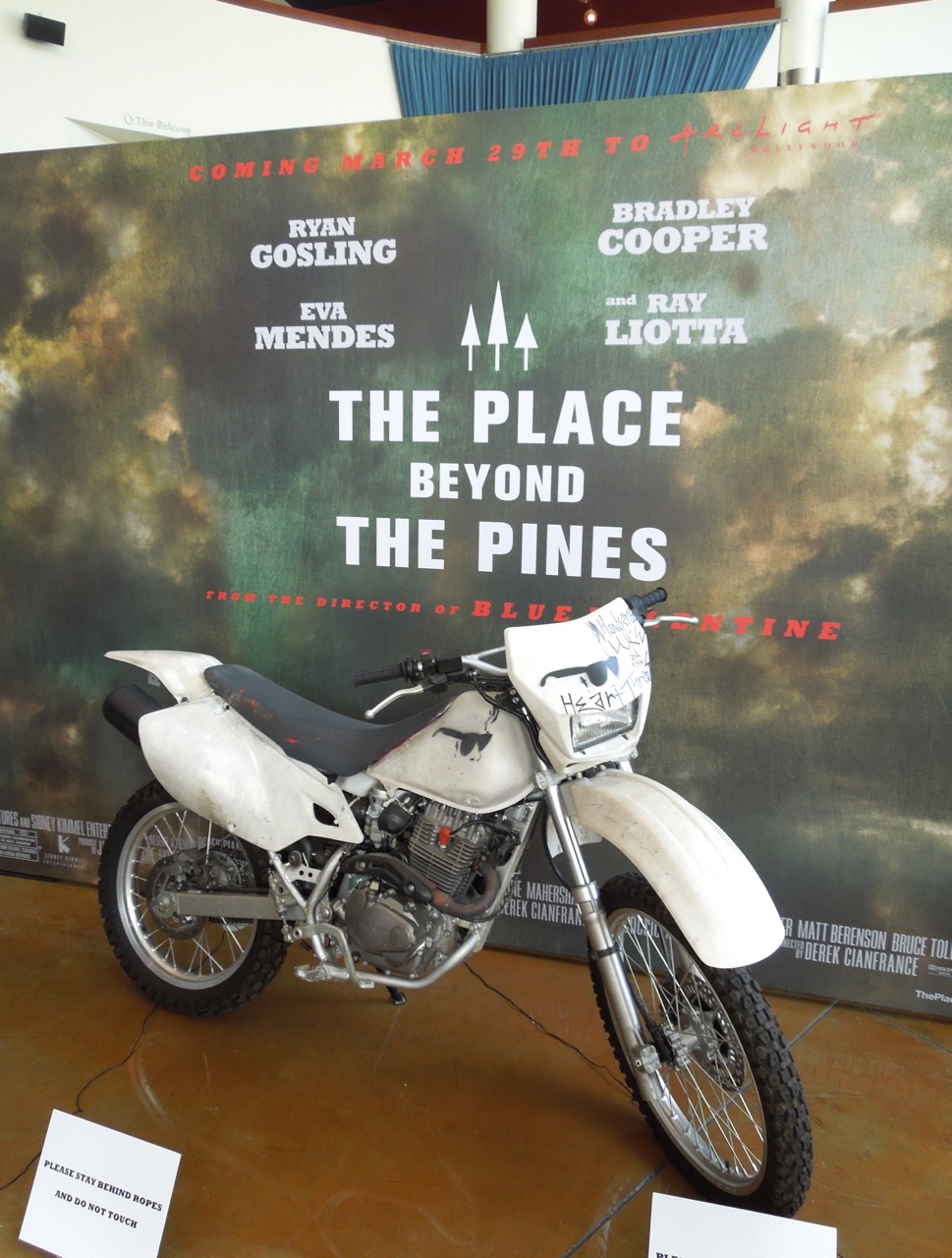 Hollywood Movie Costumes And Props Costumes And Motorcycle From The Place Beyond The Pines On Display