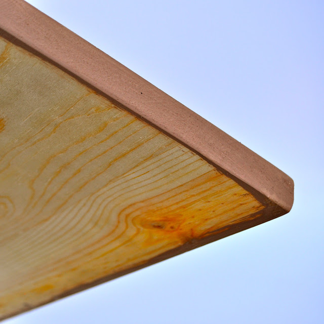 wood pieces with sides painted brown