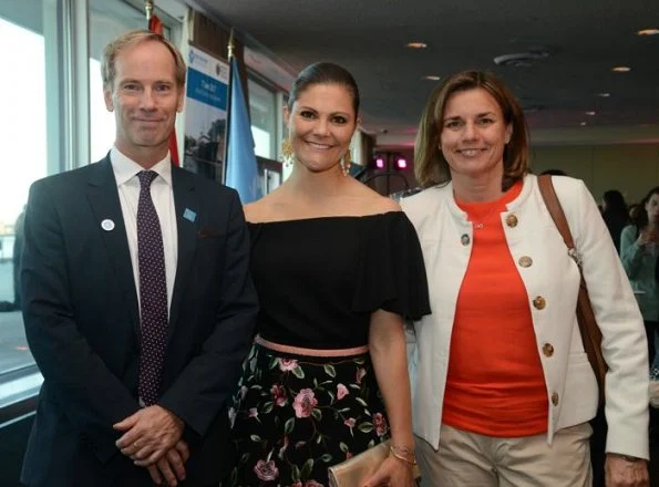 Crown Princess Victoria and Prince Albert of Monaco attended the "Ocean Conference. Princess Victoria wore  floral printed skirt. carried Anya Hindmarch Gold Metallic Clutch