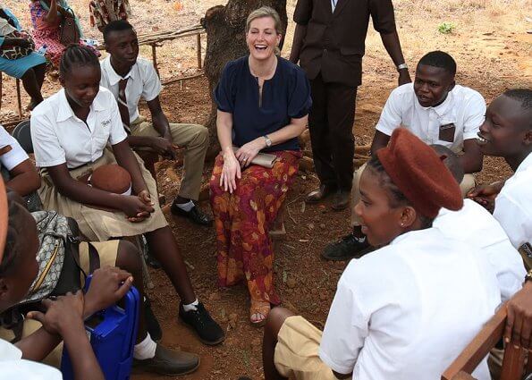 The Countess of Wessex visited Russell Technical School in Sierra Leone and visited Tombo Health Clinic. floral print trousers