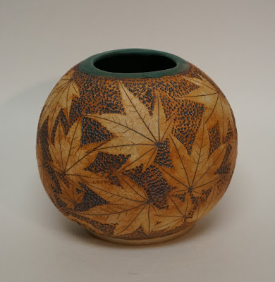 Beautiful maple leaf imprinted and stained pottery vase by Lily L.